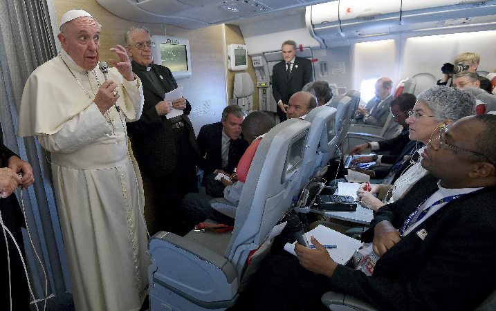 Image result for pope francis on airplane