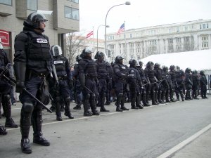 riot police catholic media