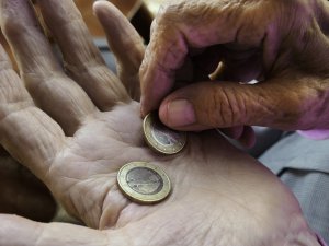 hands coins alms